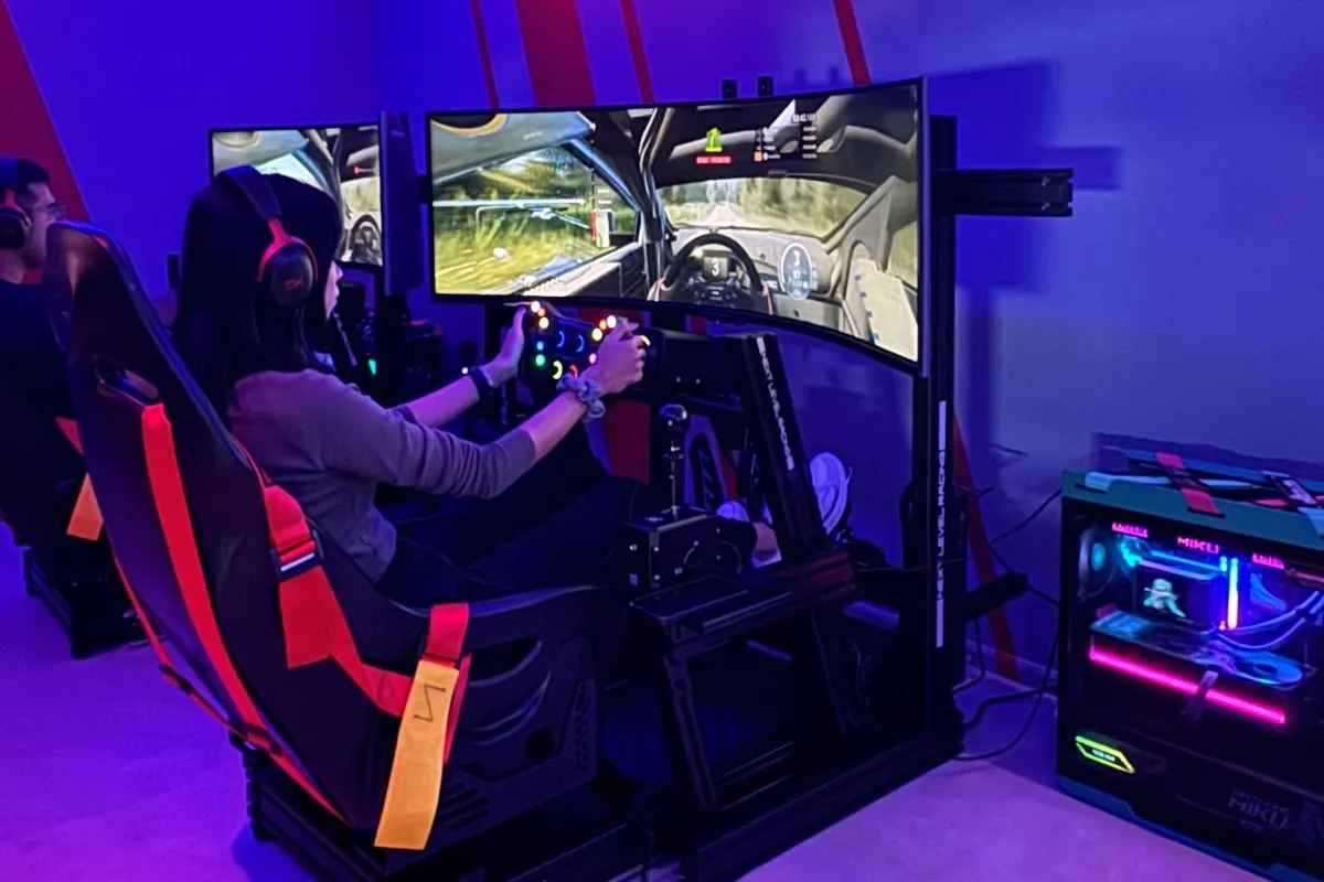 A guest driving on a racing rig